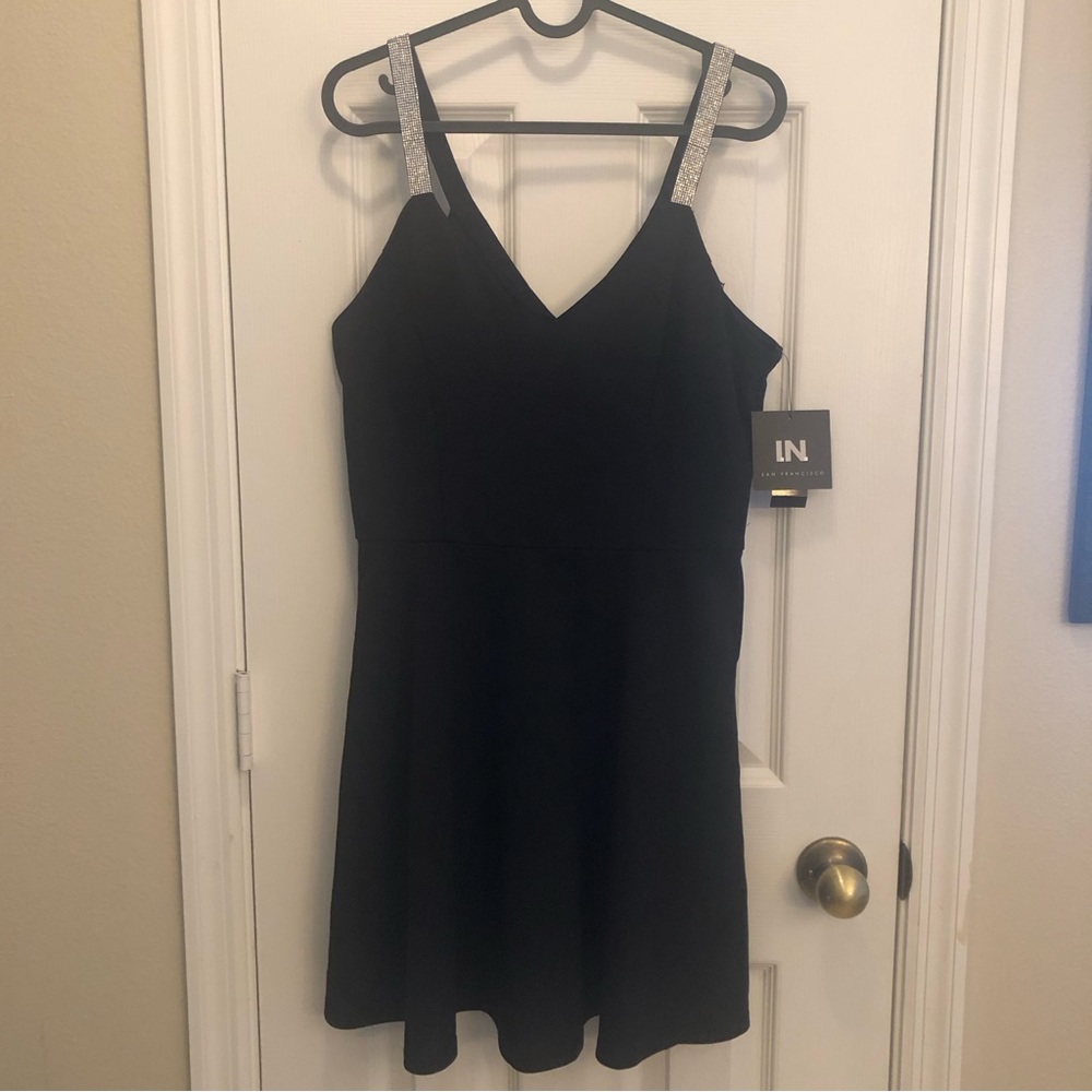 Black cocktail dress with beaded silver straps